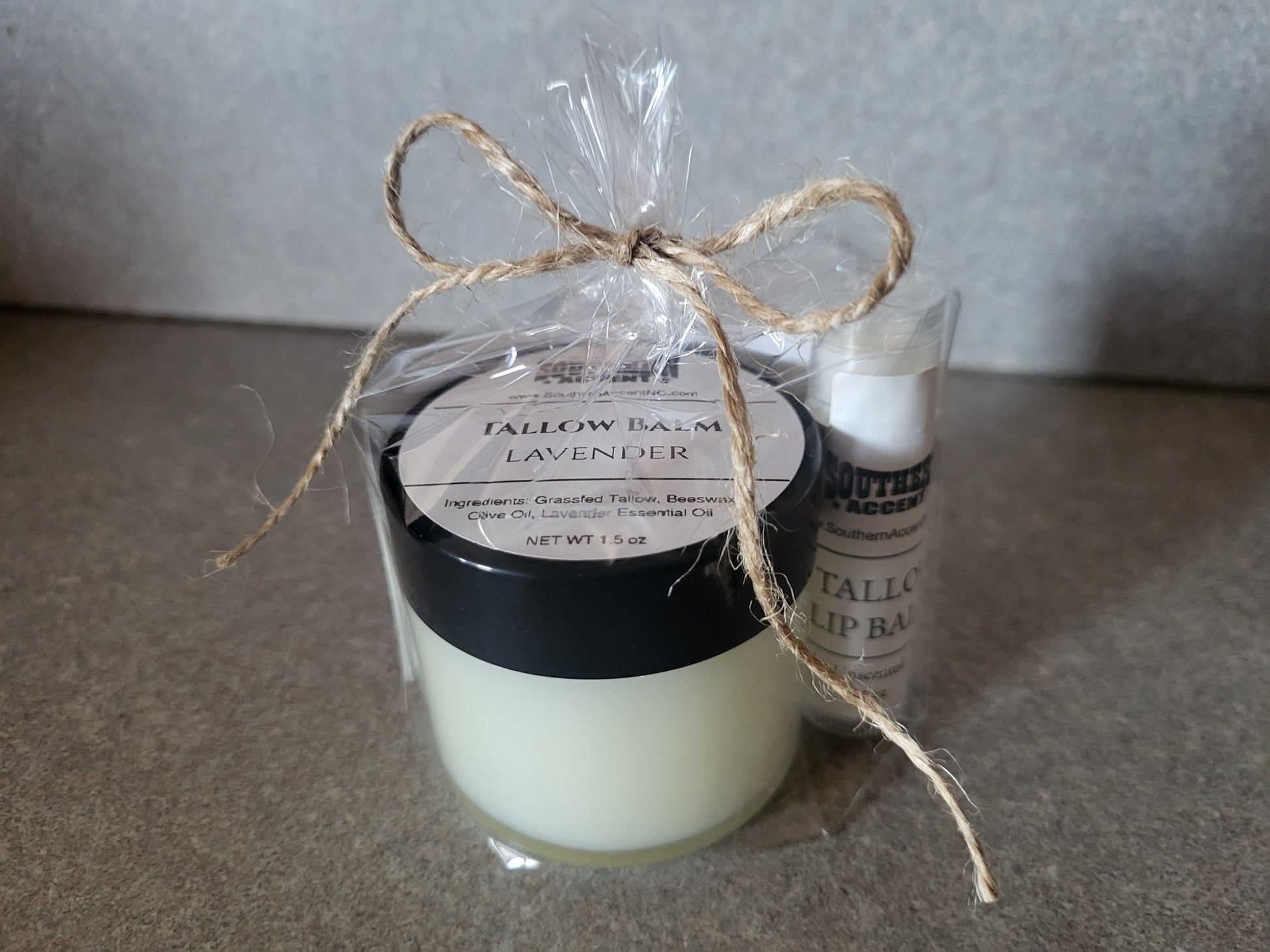 Southern Accent tallow balm and lip balm set with gift packaging on a neutral background